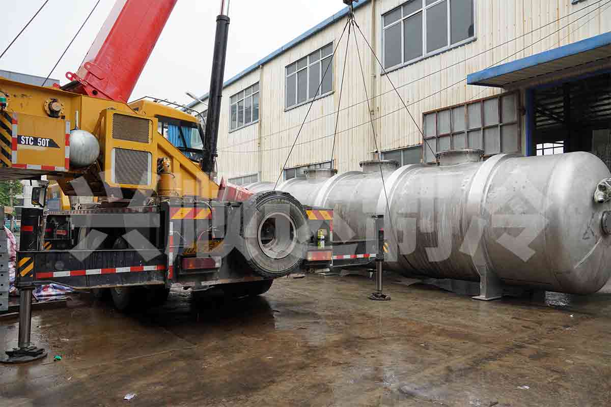 Large freeze dryer chamber being loaded for shipment